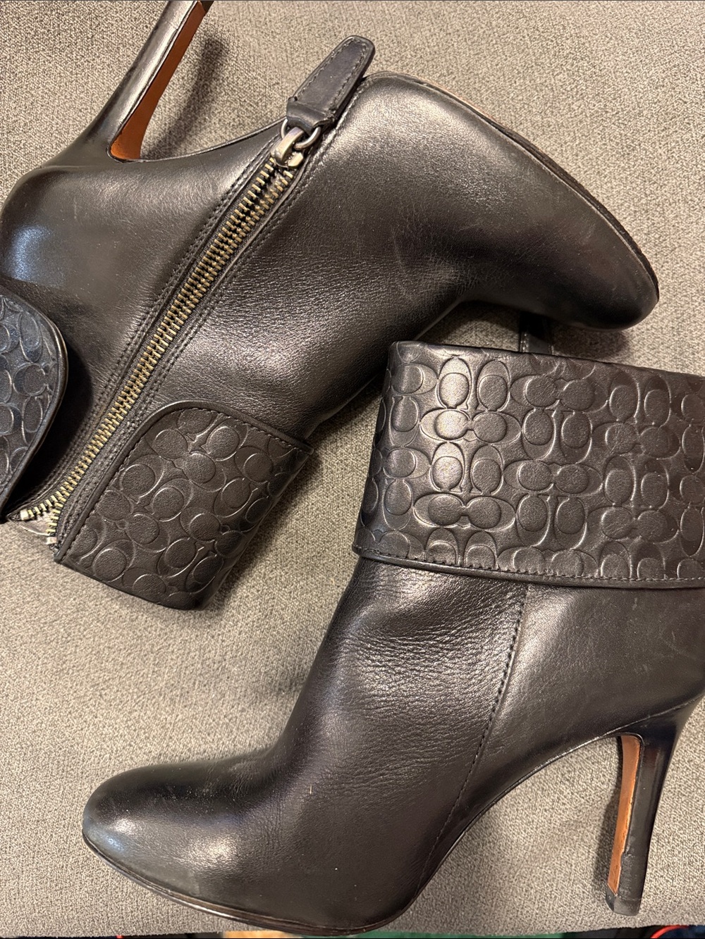 Coach Black Leather High Heel Ankle Boots with Signature Embossed Cuff